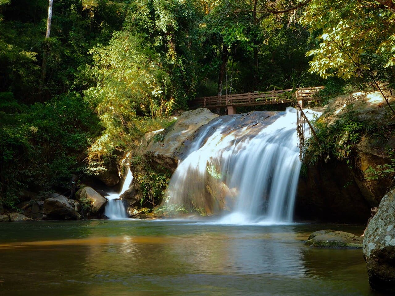 Water flowing over rocks at Mae Sa Waterfall in Chiang Mai